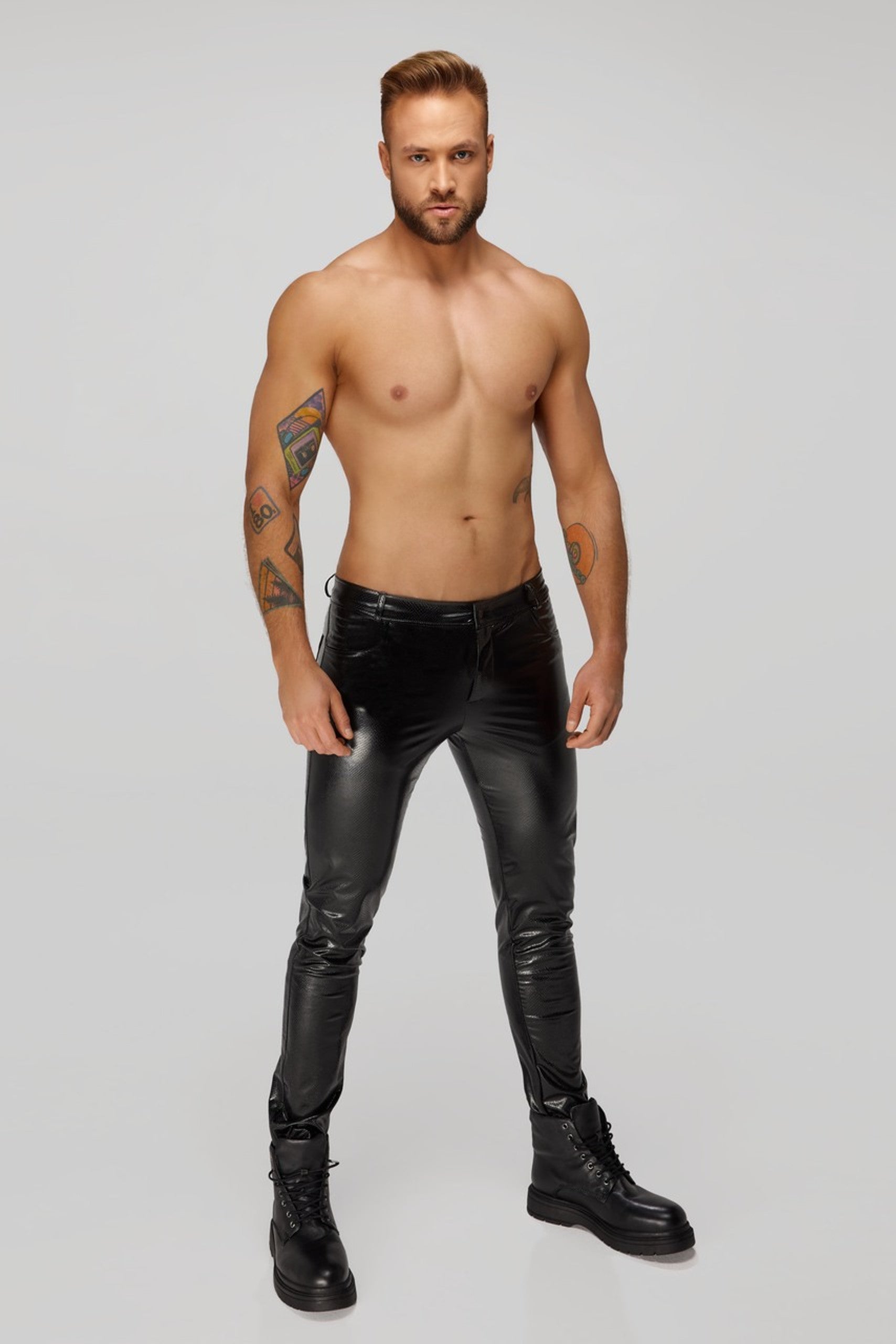 Noir handmade Long pants made of snake wetlook with back pockets