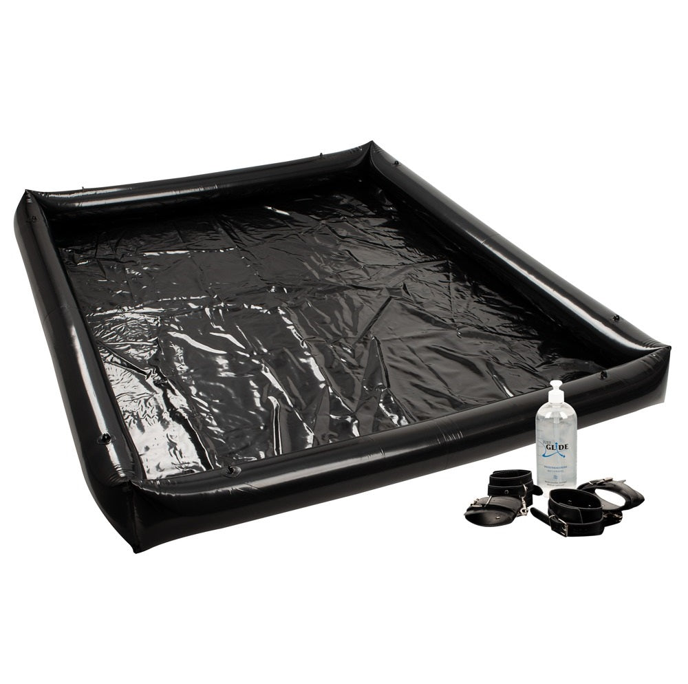 Vinyl sheet with an inflatable border and restraint eyelets